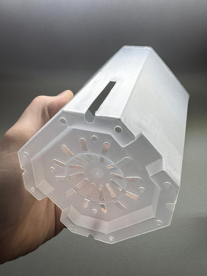 Bottom view of 17x12cm clear planter pot featuring drainage holes and side slits to prevent overwatering and promote root aeration.